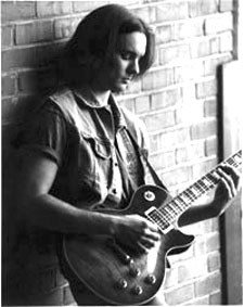 Photograph of a guy with a guitar