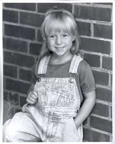 Photograph of a a little girl with blonde hair