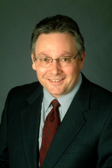 Photograph of a handsome man with glasses